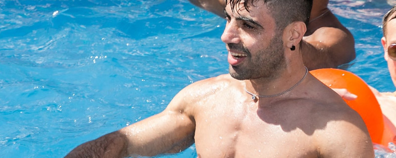 muscled bear at Bear Week Pool Party Sitges